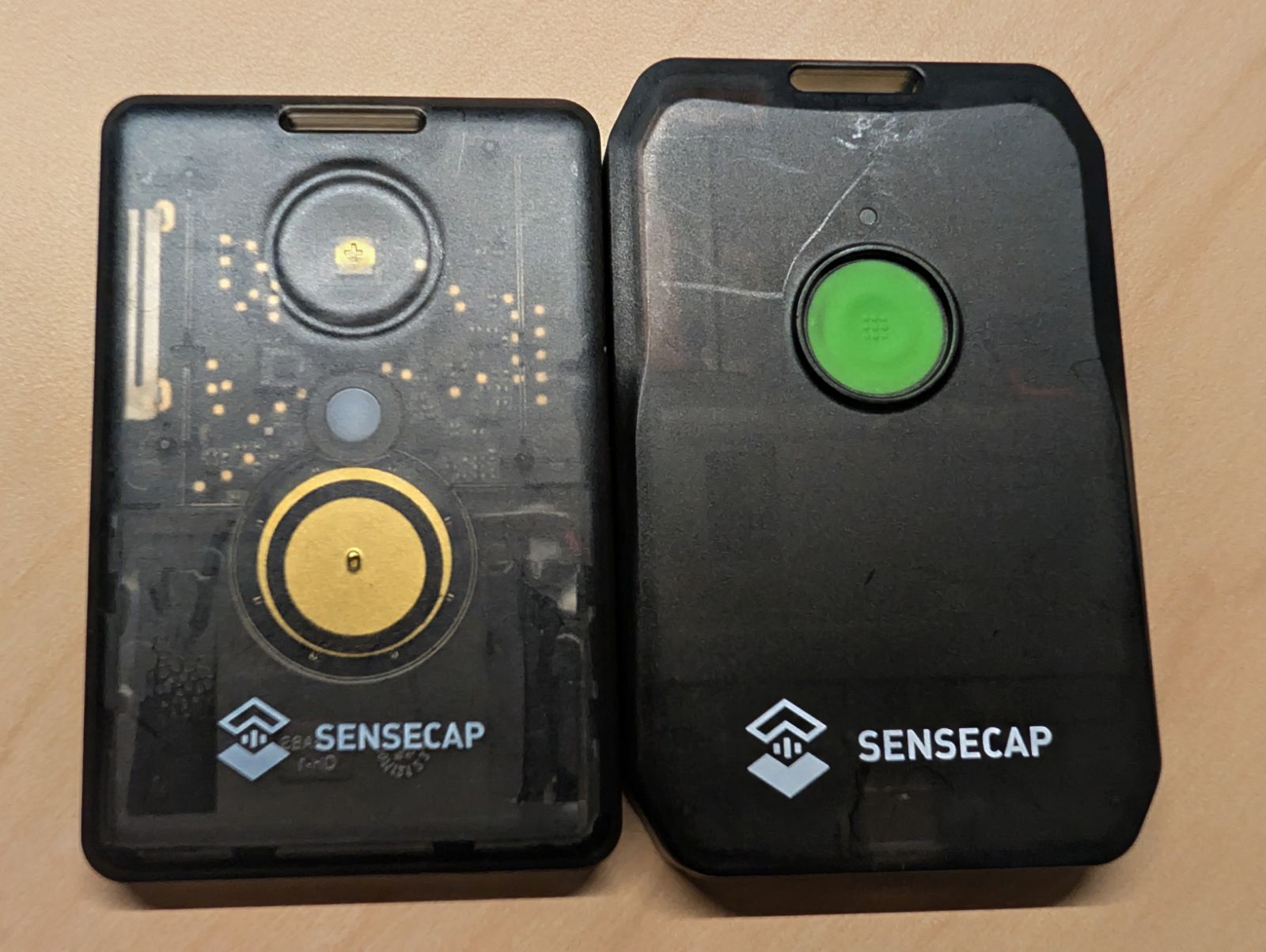 SenseCAP T1000-E and MeshTracker X1 opened to show internal PCBs and antennas side by side