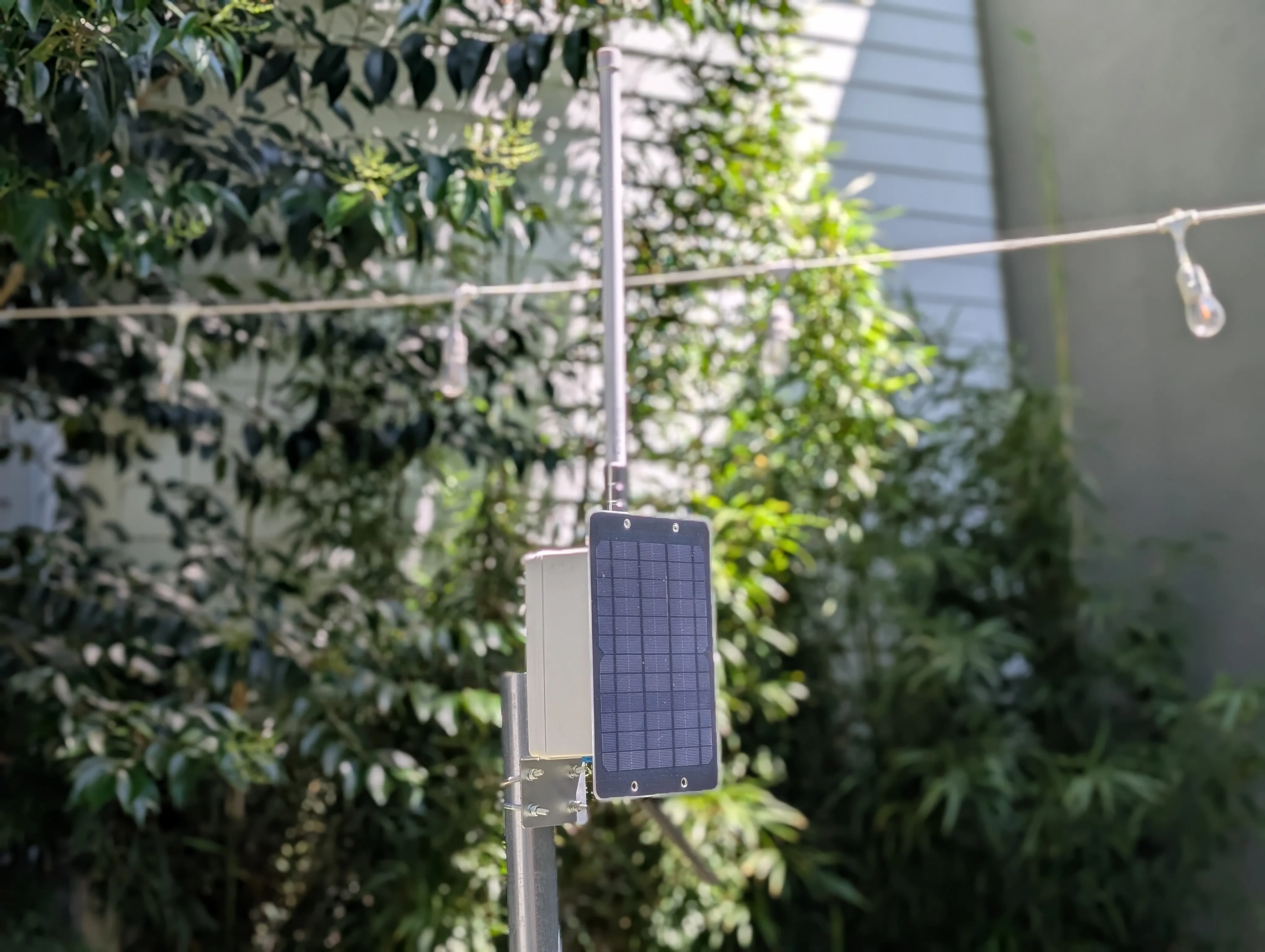 Outdoor mesh node with solar panel installed